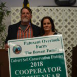 Donnie Bowen and wife Vickie with a sign presented by Calvert SCD